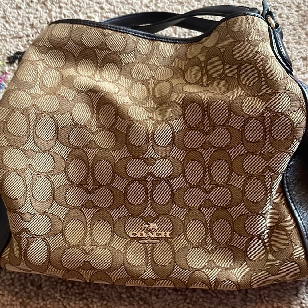 brown and black coach bag